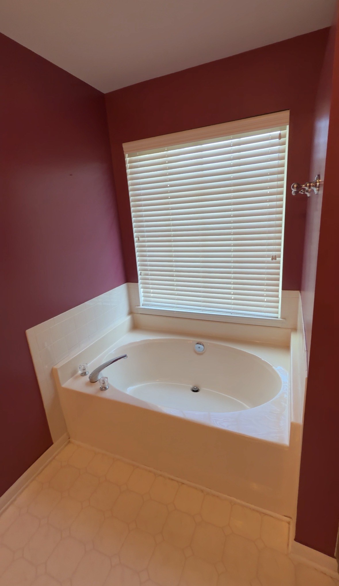 Original bathtub beneath the bathroom window
